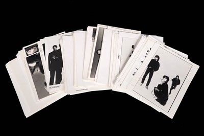 Lot 1353 - Record label promotional black and white photographs of bands and musicians