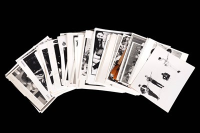 Lot 1355 - Record label promotional black and white photographs of bands and musicians