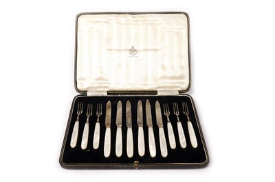 Lot 1650A - An Art Deco cased set of six pairs of silver fruit knives and forks