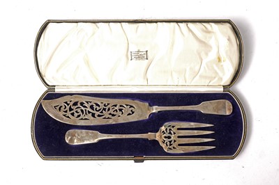 Lot 1652 - A cased pair of Victorian silver fish servers