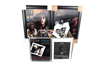 Lot 368 - A box of mixed music related memorabilia, tour programmes, framed prints, and lenticular posters