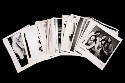 Lot 1358 - Record label promotional black and white photographs of bands and musicians