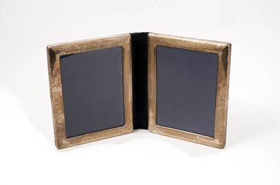 Lot 330 - A silver mounted double photograph frame by Carr's