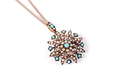 Lot 570 - A turquoise and seed pearl starburst pattern pendant brooch