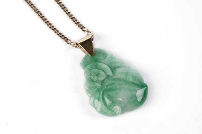 Lot 572 - A jadeite pendant necklace on chain