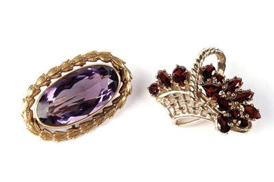 Lot 573 - Two gemstone brooches