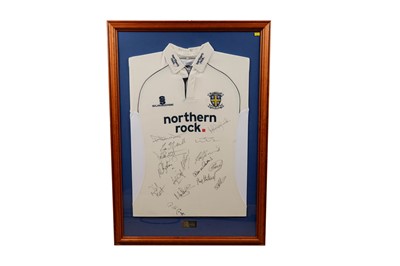 Lot 874 - An autographed Durham County Cricket Club shirt