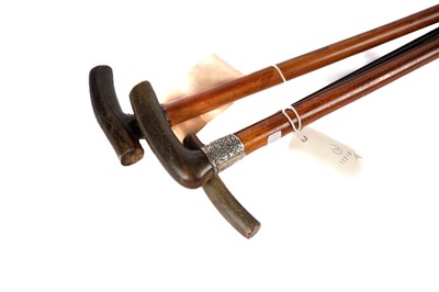 Lot 1017 - Three horn handled walking sticks