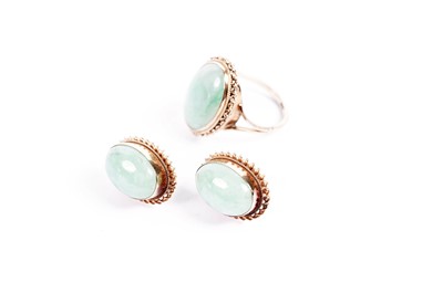 Lot 619 - A jade dress ring; and a pair of similar earrings