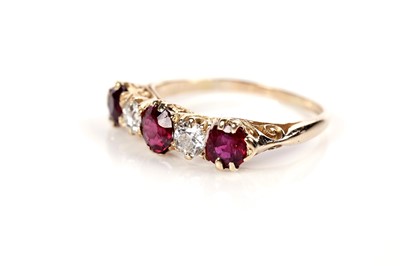 Lot 1270 - A ruby and diamond ring