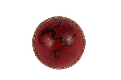 Lot 866 - A cricket ball autographed by Australian cricketer Brett Lee