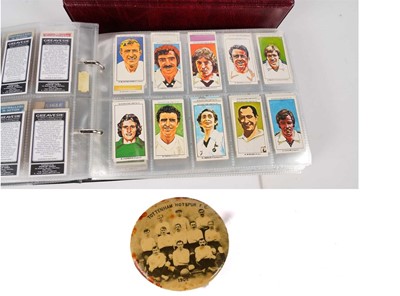 Lot 792 - Tottenham Hotspur 1901 squad pin badge; and two binders of Tottenham Hotspur cigarette cards