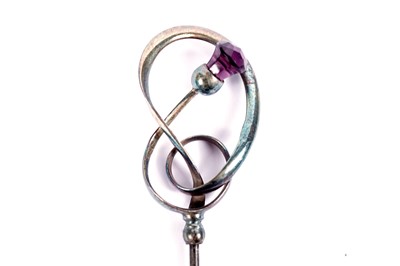 Lot 728 - Two Arts and Crafts silver hat pins, by Charles Horner