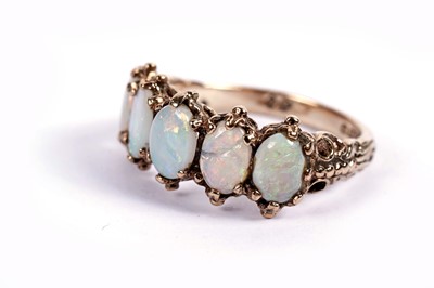 Lot 515 - An opal five-stone ring