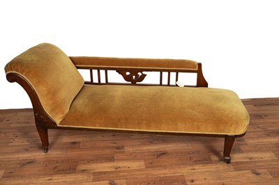 Lot 14 - An Edwardian oak chaise longue