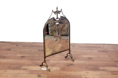 Lot 11 - A Victorian brass fire screen