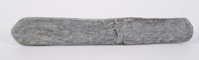 Lot 1504 - A 20th Century Inuit stone carving of a figure on dog sled