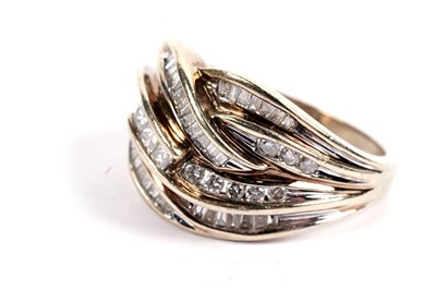 Lot 502 - A diamond dress ring in an entwined knot pattern