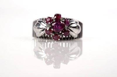 Lot 1099 - A ruby cluster ring