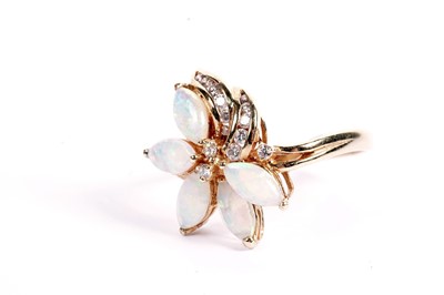 Lot 507 - An opal and diamond dress ring