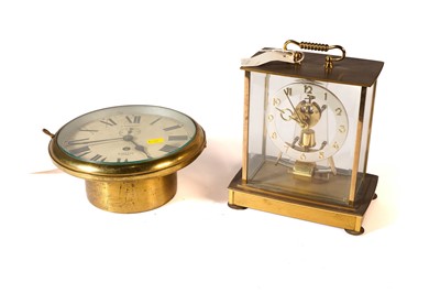 Lot 1146 - A brass 8” Smiths Astral bulkhead clock; and a Kundo electronic mantel clock