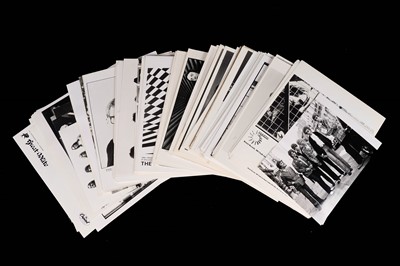 Lot 1366 - Record label promotional black and white photographs of bands and musicians