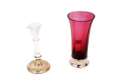 Lot 857 - An Elizabeth II silver-mounted and ruby flashed vase; and silver mounted candlestick