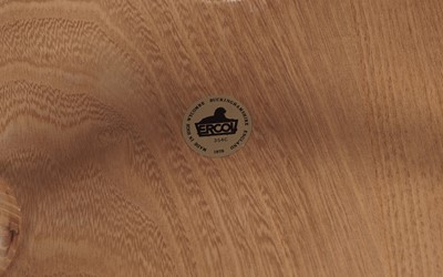 Lot 765 - An Ercol model 354 ‘Pebble’ nest of three elm topped tables