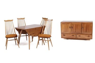 Lot 767 - An Ercol elm and beech dining room suite