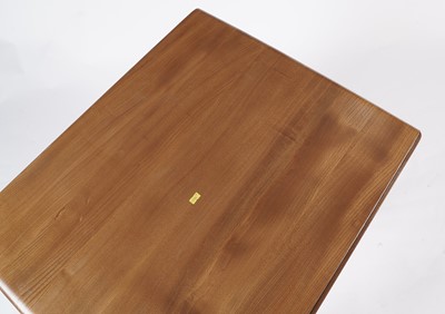 Lot 770 - An elm and beech model 492 Windsor drop leaf dining table