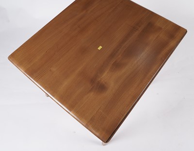 Lot 770 - An elm and beech model 492 Windsor drop leaf dining table