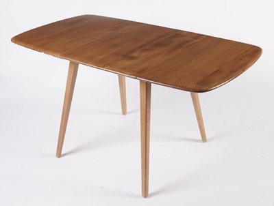 Lot 770 - An elm and beech model 492 Windsor drop leaf dining table