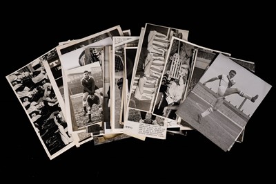 Lot 1372 - Press Association football player black and white photographs