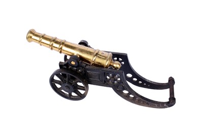 Lot 53 - ﻿An early 20th Century miniature brass and cast iron canon