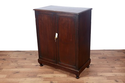 Lot 8 - An early 19th Century oak cabinet