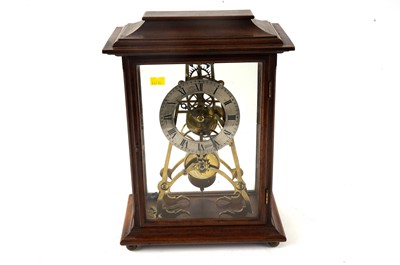 Lot 122 - A late 19th Century oak skeleton mantel clock