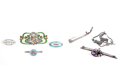 Lot 188 - Three silver brooches by Charles Horner; and four silver and enamel brooches