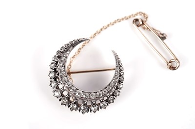 Lot 1281 - A Victorian diamond crescent brooch