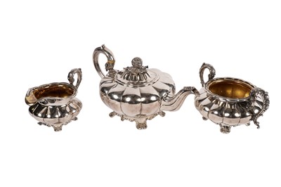 Lot 332 - An early Victorian three-piece old Sheffield plate tea service