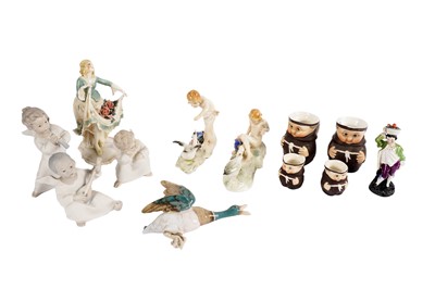 Lot 327 - A collection of Volkstedt and other figures including: three Lladro ceramic putti