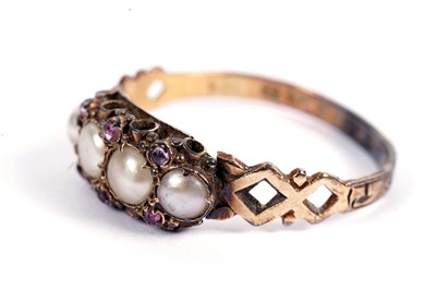 Lot 446 - A 19th Century half-pearl and ruby ring