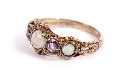 Lot 445 - A Victorian-style opal and amethyst ring