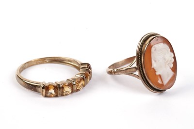 Lot 478 - A five-stone citrine ring; and a cameo ring