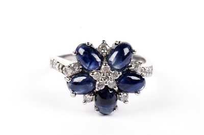 Lot 459 - A sapphire and diamond dress ring