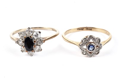 Lot 457 - A sapphire and diamond ring; and one other