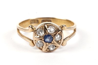 Lot 455 - A sapphire and diamond cluster ring