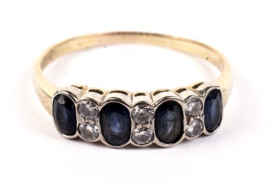 Lot 466 - A sapphire and diamond dress ring