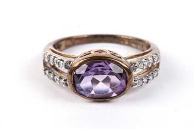 Lot 468 - An amethyst and diamond dress ring