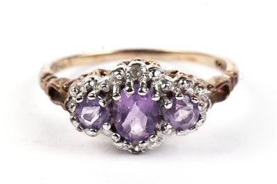 Lot 469 - An amethyst and diamond cluster ring