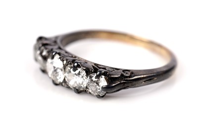 Lot 1232 - A Victorian five stone diamond ring